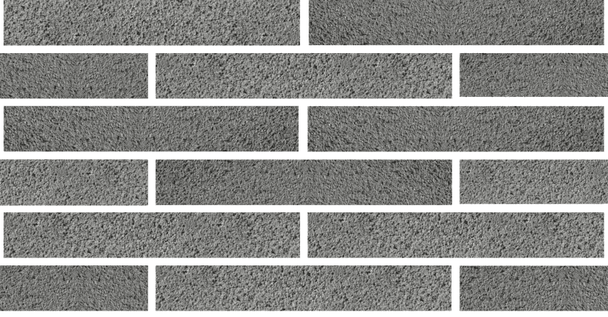 The Bespoke Refined Pure White wallpaper features a pattern with a consistent rectangular layout, mimicking a traditional brick wall. Its texture provides a rough look, creating an authentic stone-like appearance.