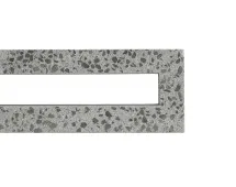 A rectangular piece of speckled grey concrete, the GB Breeze Blocks linear Nickel, features a central rectangular cut-out. Pictured on a white background, only the object’s top left corner is visible in the image.