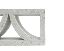 The GB Breeze Blocks Arc Pottery is a rectangular concrete block with geometric cutouts—a triangle and two curves—displayed on the left side of a white background, evoking the Arc Pottery design.