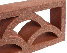 A close-up of the GB Breeze Blocks Cloud Pottery, featuring reddish-brown blocks with geometric arched and rectangular cutouts, inspired by Arc Pottery and designed for architectural or garden wall applications.
