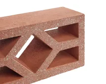 A red, rectangular, hollow clay GB Breeze Blocks Diamond Pottery brick with three diagonal and two horizontal openings sits on a white background.