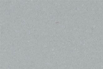 A close-up of the Broadway Oyster surface reveals a plain gray texture, subtly complex like those in Broadway set designs, with a speckled appearance and natural shade variations similar to an oyster's shell.